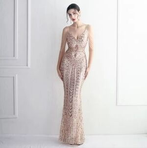 Elegant Gold Sequin Maxi Dress with Draped Shoulder Chains